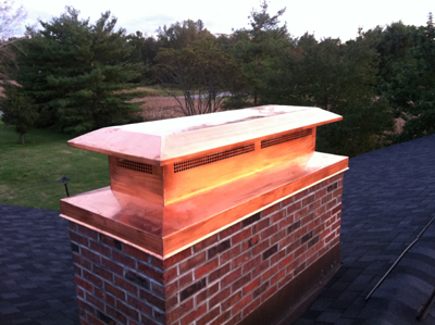 Before and after chimney cap replacement in Bay Shore, NY