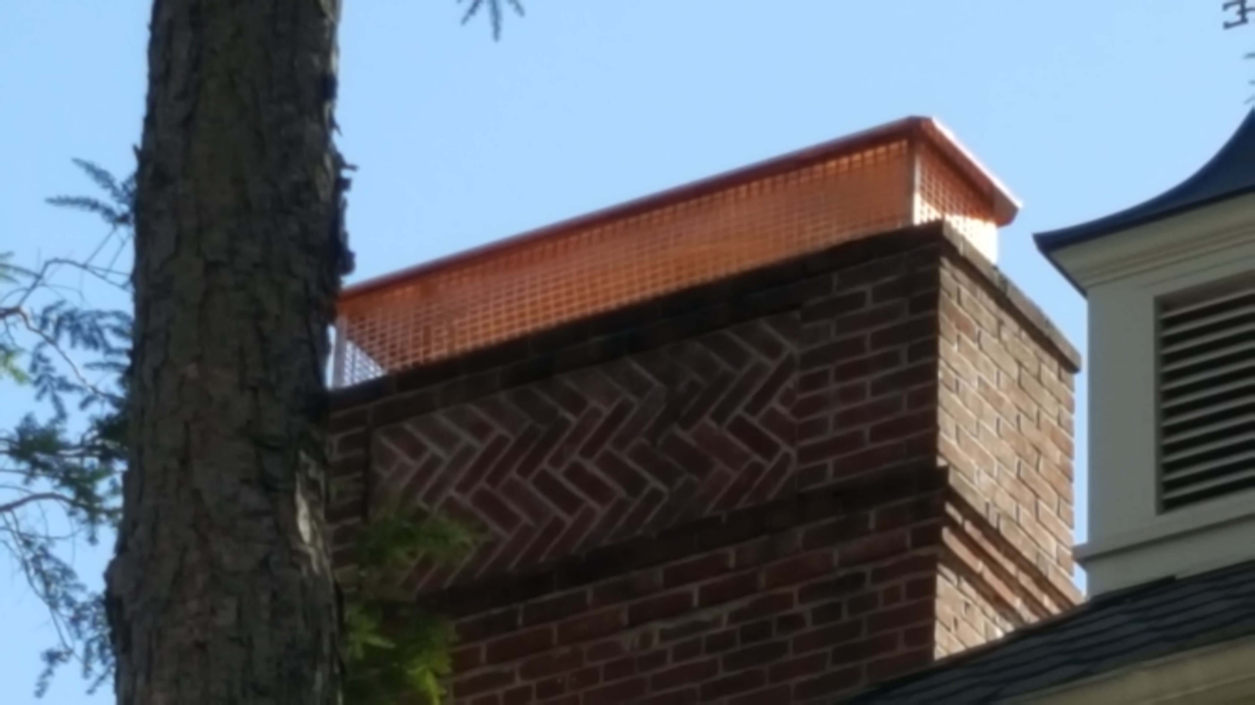 New stainless steel chimney cap installed in Bay Shore, NY