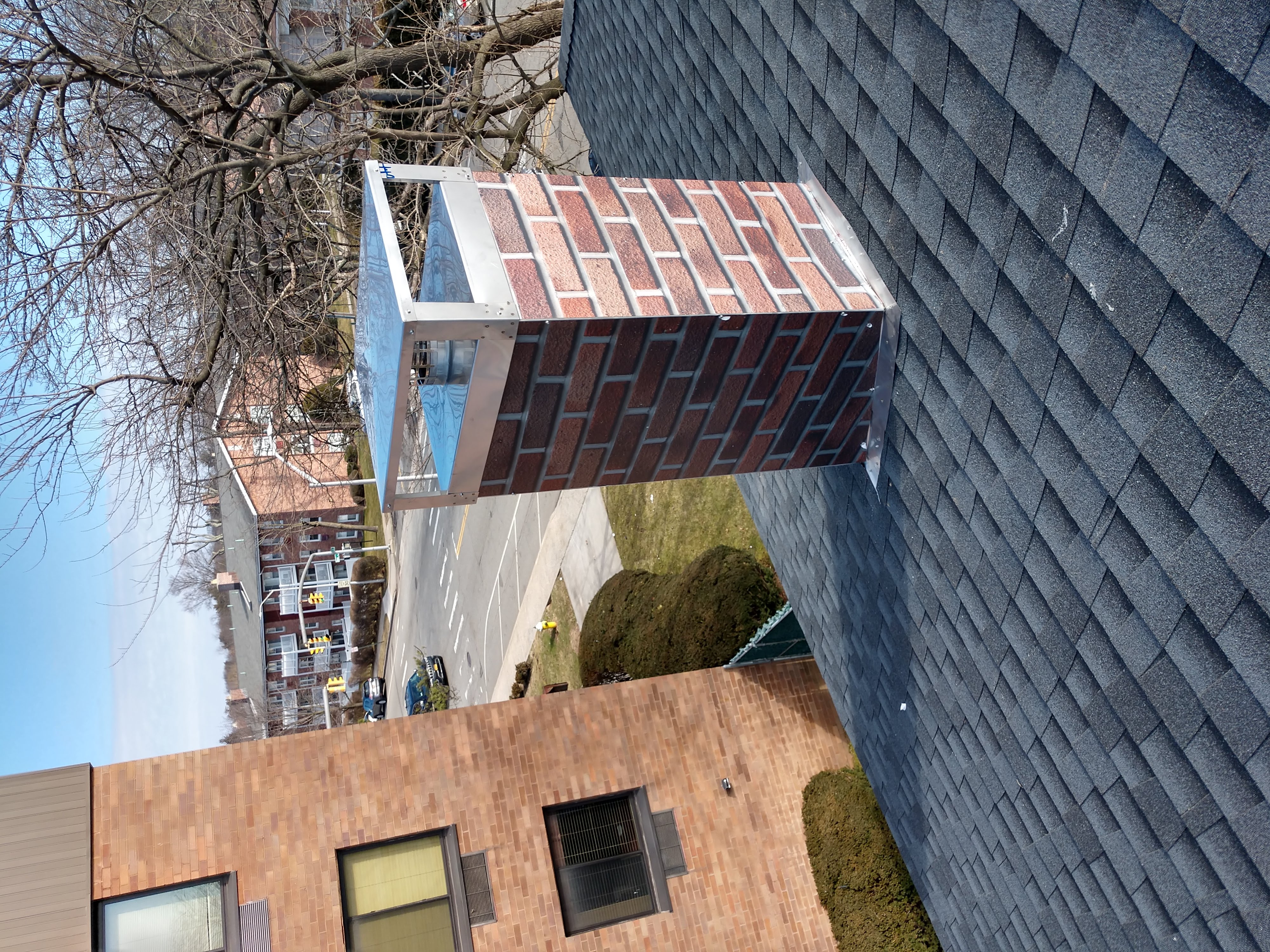 New elastomeric sealant applied to chimney crown in Bay Shore, NY