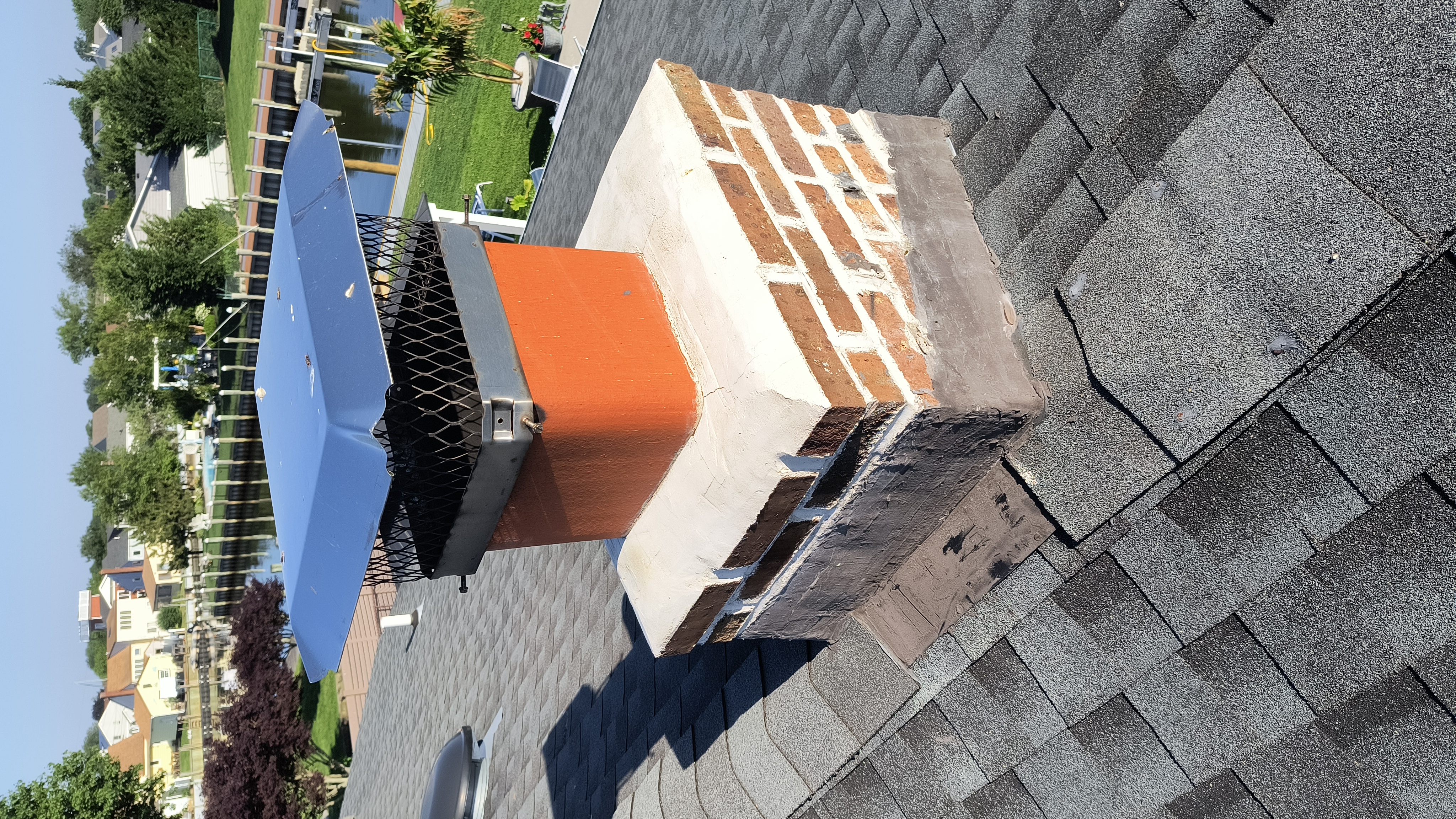 Full chimney masonry rebuild and restoration in Bay Shore, NY