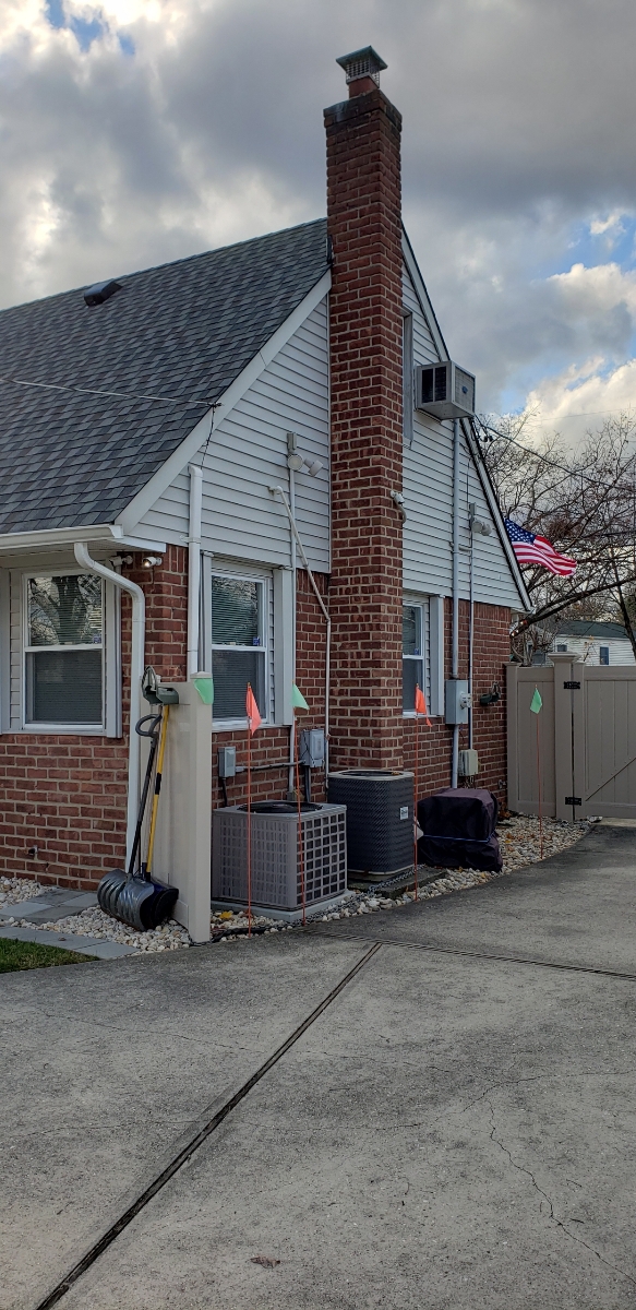 Professional chimney repointing restoring brick joints in Bay Shore, NY