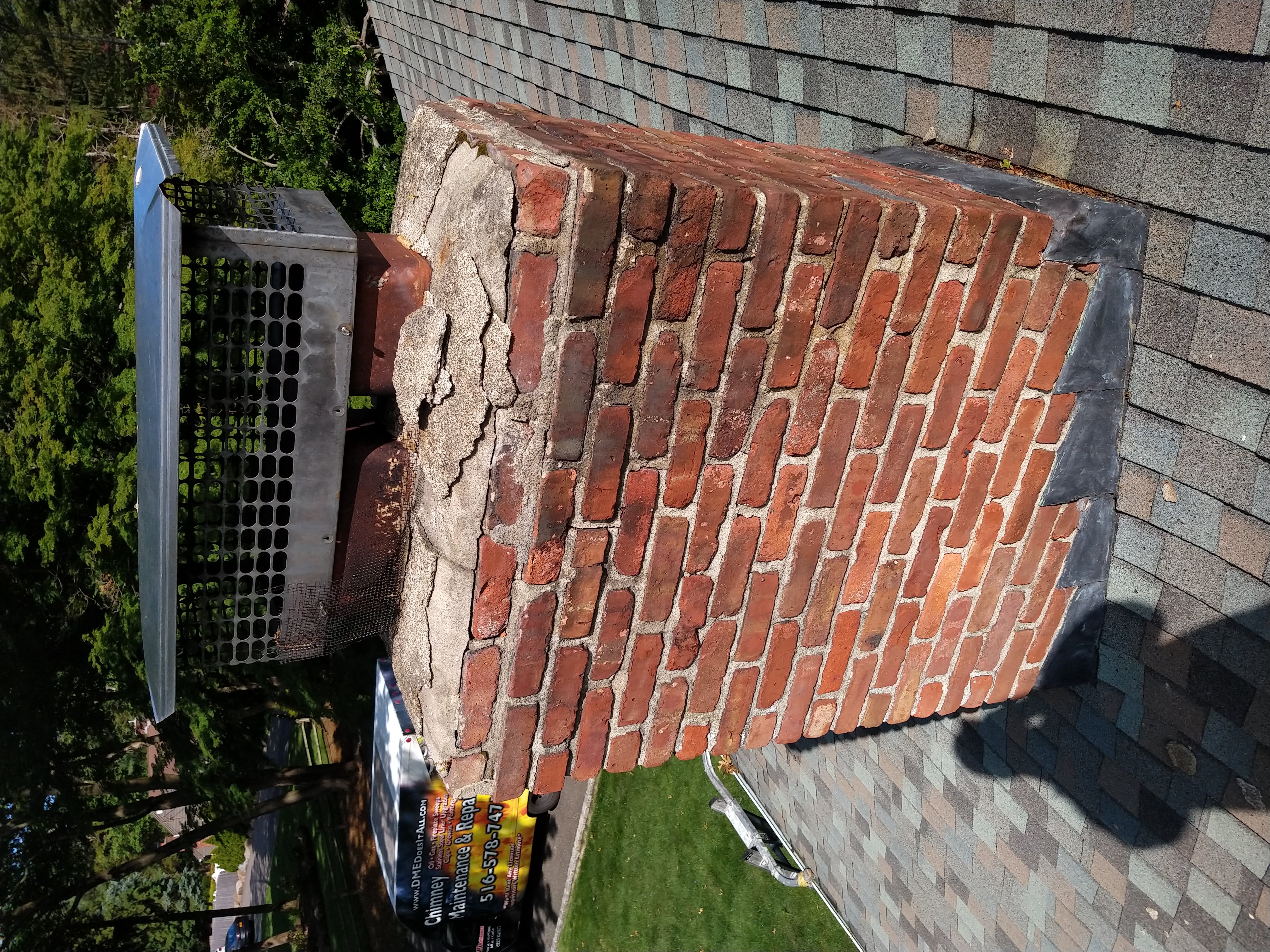 Cracked chimney crown professionally repaired in Bay Shore, New York